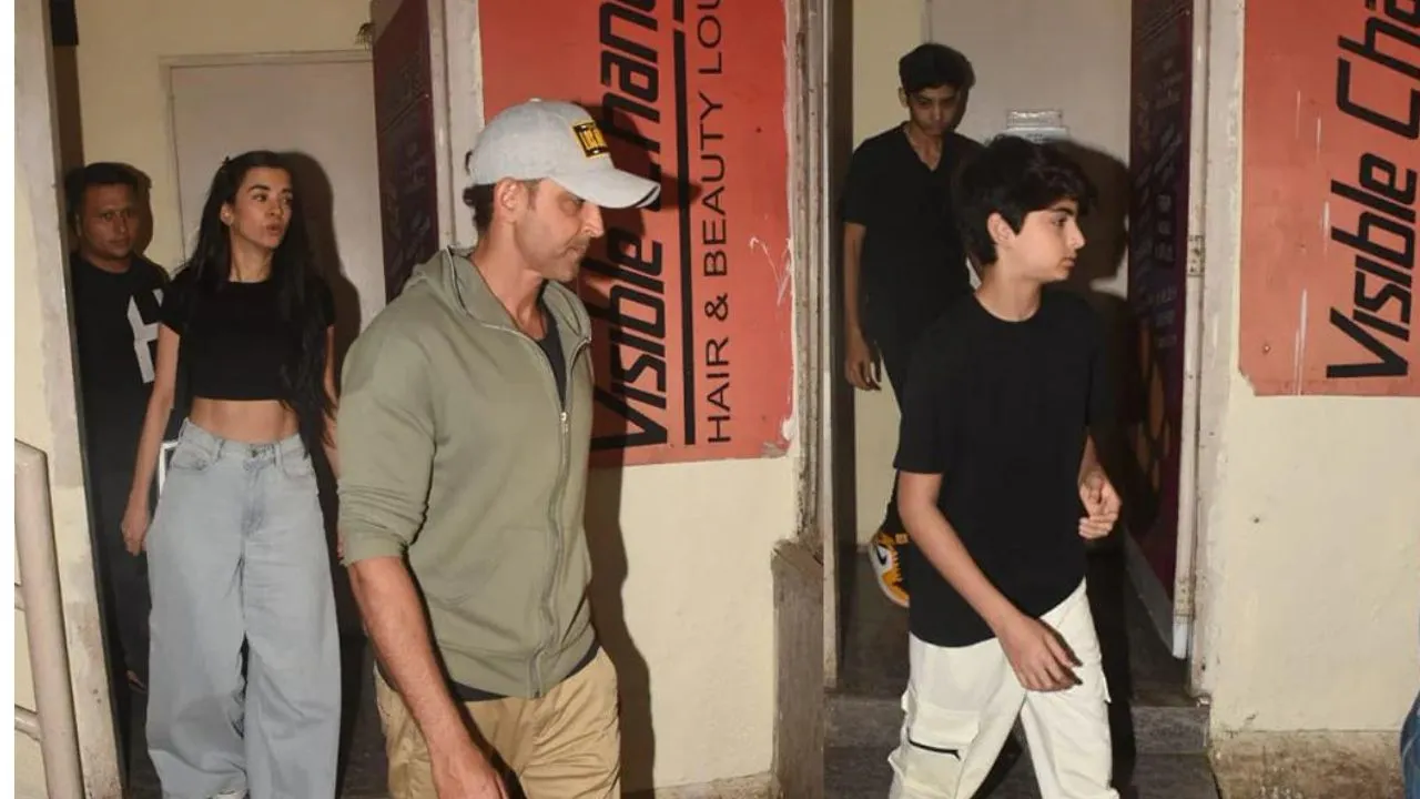 Hrithik Roshan arrives to watch the film with girlfriend Saba Azad and son
