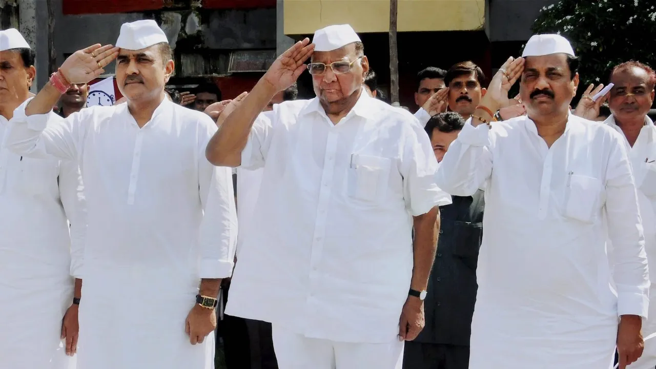 In this Thursday, July 10, 2016, file photo, Nationalist Congress Party (NCP) President Sharad Pawar with party leaders Praful Patel and Sunil Tatkare during the party's Vidarbha region convention, in Nagpur.