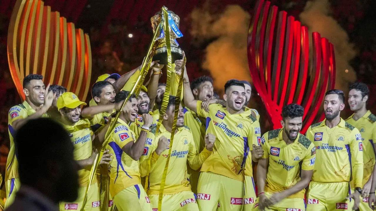 Chennai Super Kings players celebrate with the trophy after winning the Indian Premier League (IPL) 2023, at the Narendra Modi Stadium on May 30. Chennai beat defending champions Gujarat Titans by 5 wickets in the final