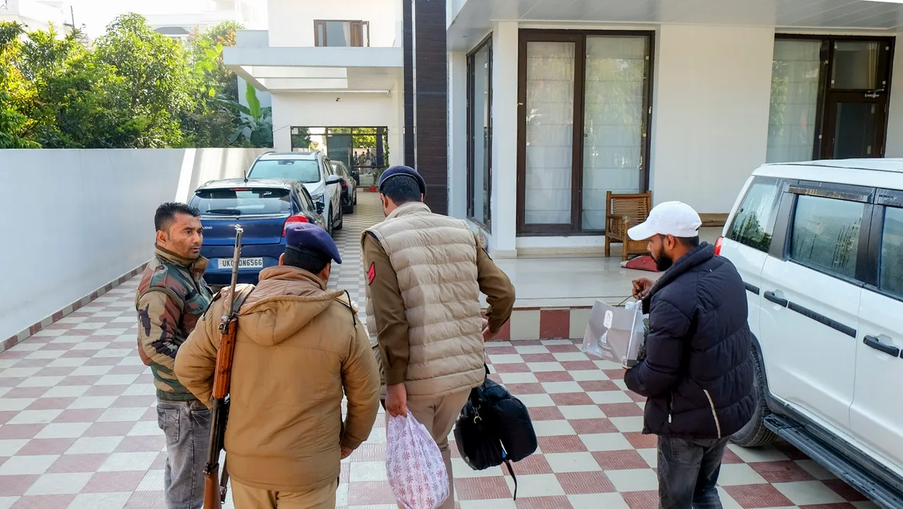 Officials during Enforcement Directorate’s (ED) raid at the residence of Congress leader and former Uttarakhand minister Harak Singh Rawat