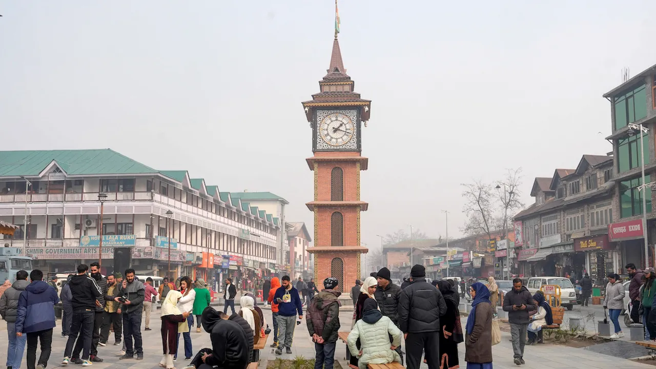 People at Lal Chowk after the Supreme Court upheld the Centre's decision to abrogate Article 370 of the Constitution, in Srinagar, Monday, Dec. 11, 2023. The apex court also issued directions to conduct elections to the J&K Assembly by September 30, 2024.