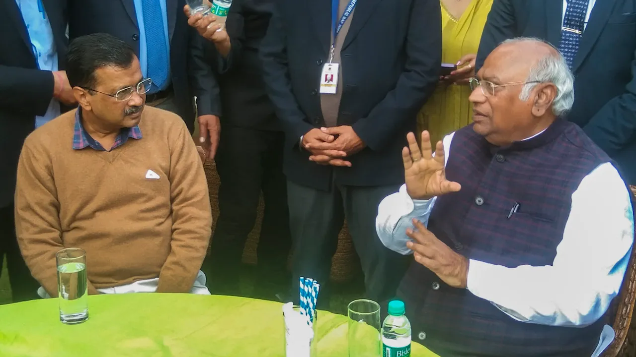 Arvind Kejriwal and Congress President Mallikarjun Kharge during a luncheon hosted by Congress leader Abhishek Manu Singhvi at his residence, in New Delhi, Sunday, Feb. 18, 2024.