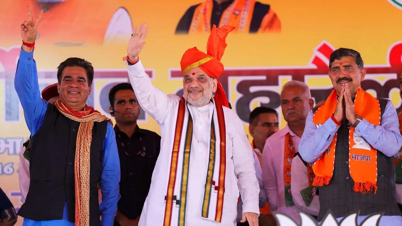 Union Home Minister Amit Shah addresses a public meeting, ahead of Lok Sabha elections, in Jammu, Tuesday, April 16, 2024