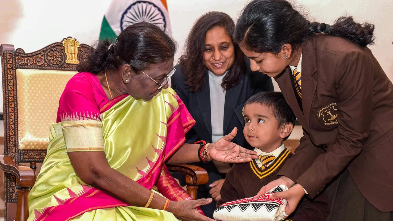 President Droupadi Murmu meets children from various schools and organisations at Rashtrapati Bhavan Cultural Centre (RBCC) on the occasion of Children's Day, in New Delhi