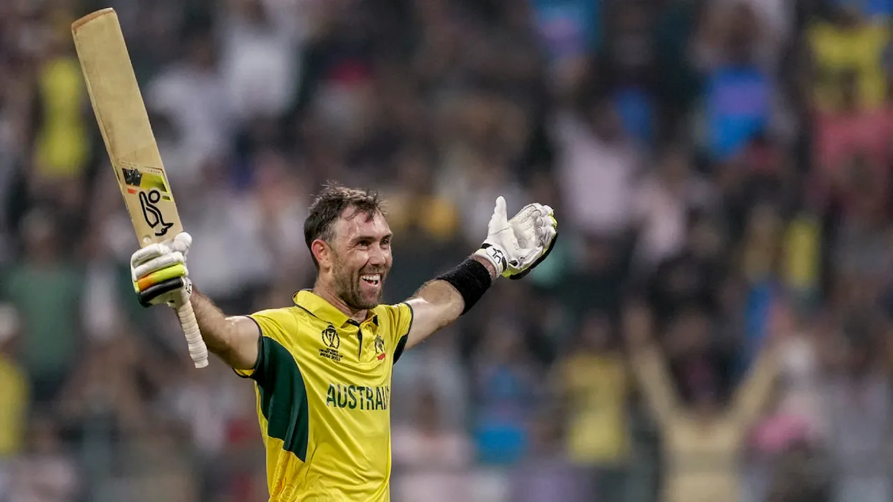 Glenn Maxwell celebrates his double century and his team's win in the ICC Men's Cricket World Cup 2023 match between Afghanistan and Australia at the Wankhede Stadium, in Mumbai, Tuesday, Nov. 7, 2023.