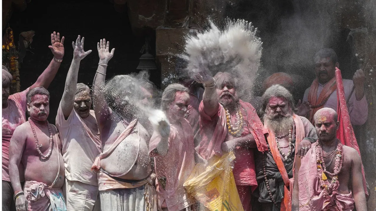 Naga sadhus play masan Holi image