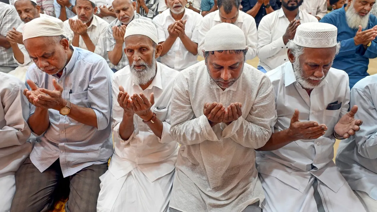 Muslim devotees offer namaz