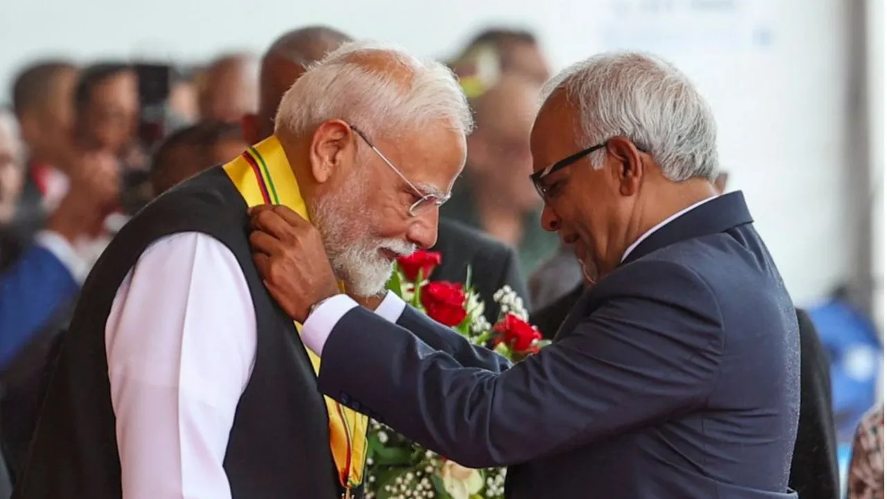 Prime Minister Narendra Modi being conferred Mauritius�s highest civilian award, the Grand Commander of the Order of the Star and Key of the Indian Ocean, by President of Mauritius Dharam Gokhool, at Port Louis in Mauritius.