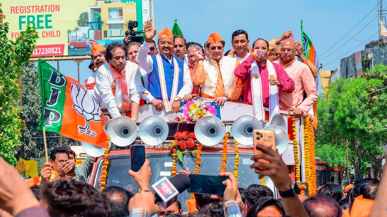 UP Deputy CM Keshav Prasad Maurya with BJP candidate Arun Govil during a road show ahead of the Lok Sabha elections, in Meerut, Tuesday, April 2, 2024.
