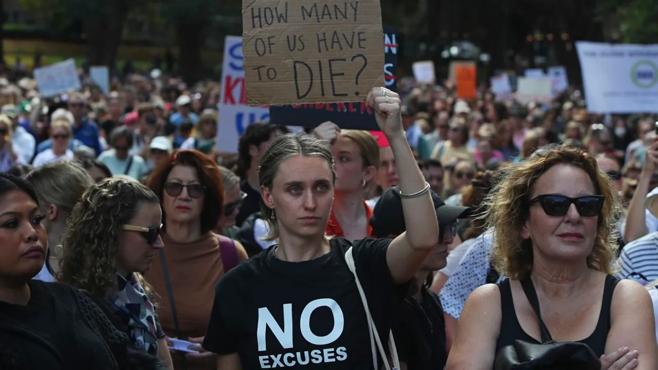 Demonstrators take part in a national rally against violence against women in Sydney on April 27, 2024