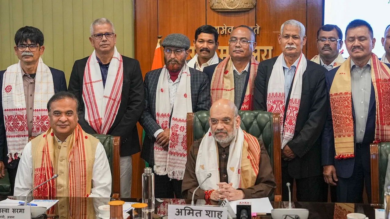 Amit Shah and Assam Chief Minister Himanta Biswa Sarma with members of United Liberation Front of Asom (ULFA) during signing of a peace accord between ULFA and the central and Assam governments, in New Delhi, Friday, Dec. 29, 2023. 