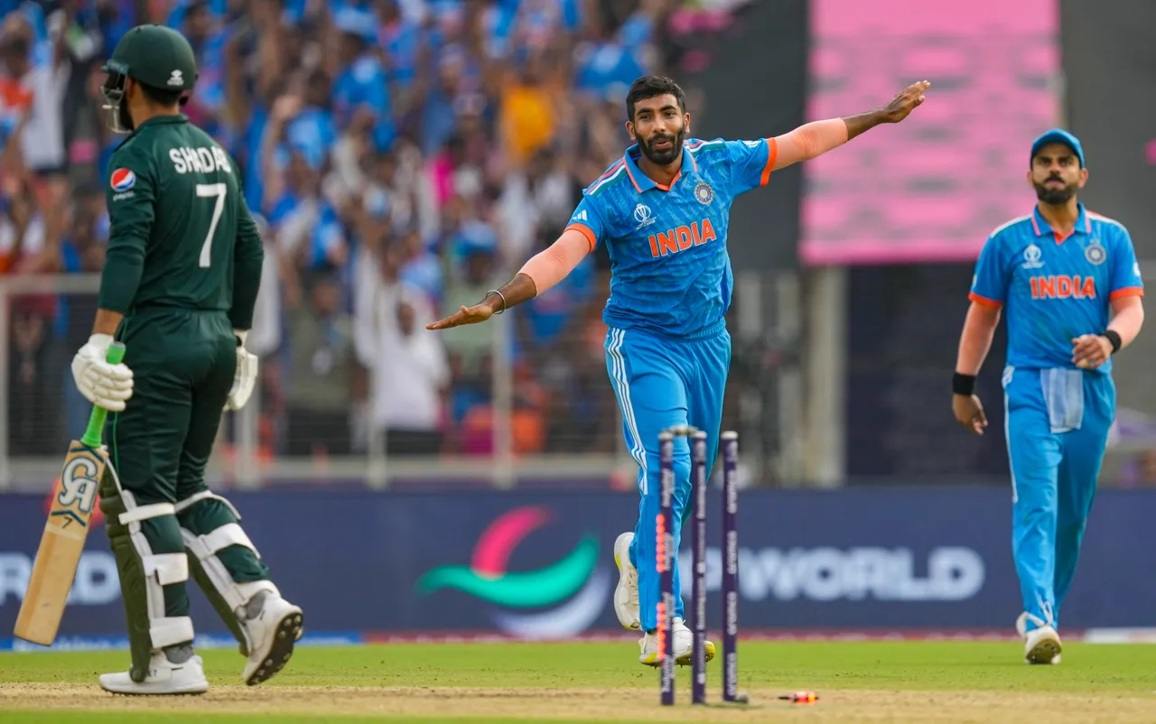 India's Jasprit Bumrah celebrates the wicket of Pakistan's Shadab Khan during the ICC Men's Cricket World Cup 2023 match between India and Pakistan, at Narendra Modi Stadium