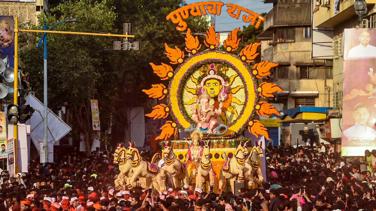 Manacha Teesara Ganapati' idol being carried by devotees for immersion after the conclusion of Ganesh Chaturthi festival, in Pune, Tuesday, Sept. 17, 2024.