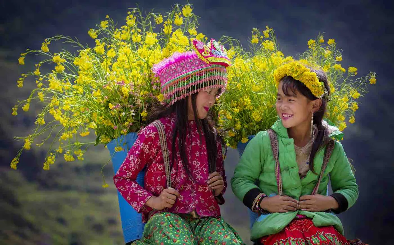 “Springtime in Ha Giang” by Nguyen Huu Thong — Hmong girls on the side of the road in Vietnam.