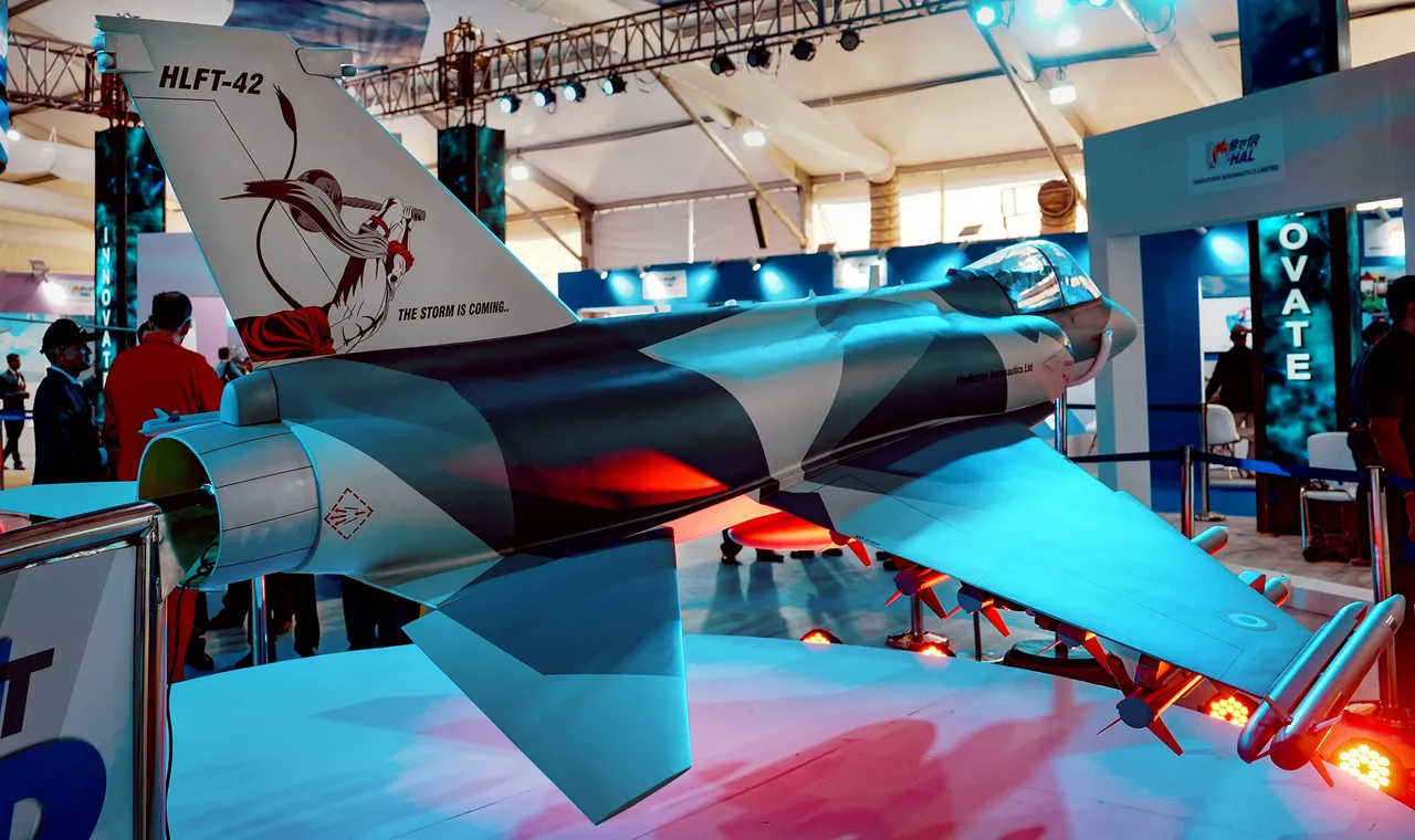 The tail of HAL's fighter aircraft with a portrait of Lord Hanuman in a pose striking with his mace with a message, 'The storm is coming' displayed during the inauguration of Aero India 2023, at Yelahanka air base in Bengaluru