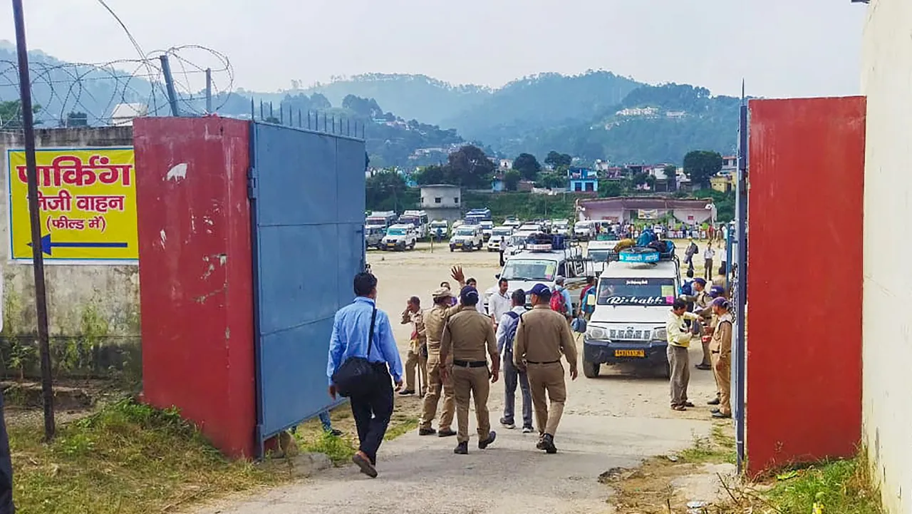 Polling officials and their accompanying security personnel being sent to related polling stations on the eve of Bageshwar assembly by-election, in Bageshwar