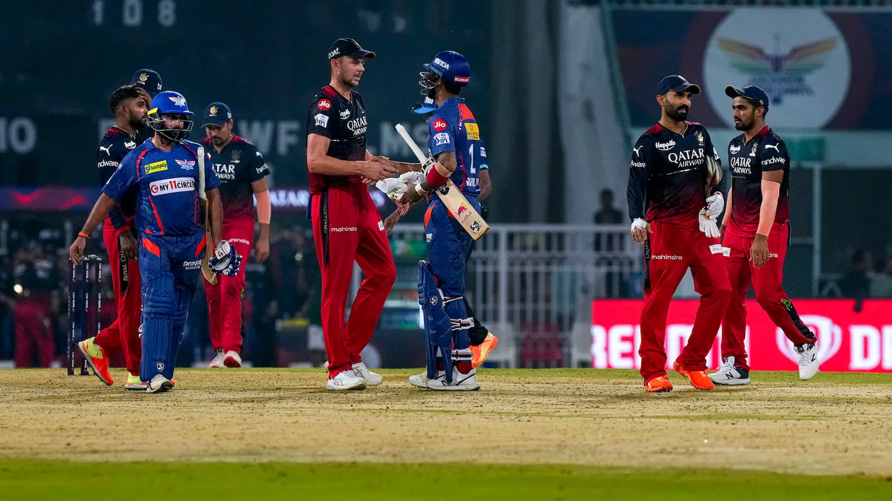 Royal Challengers Bangalore and Lucknow Super Giants players greet each other on May 1