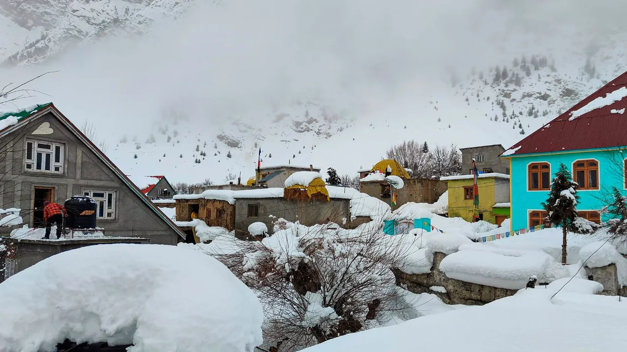 Houses at Rashil village are seen covered in snow after fresh snowfall, in Lahaul and Spiti district