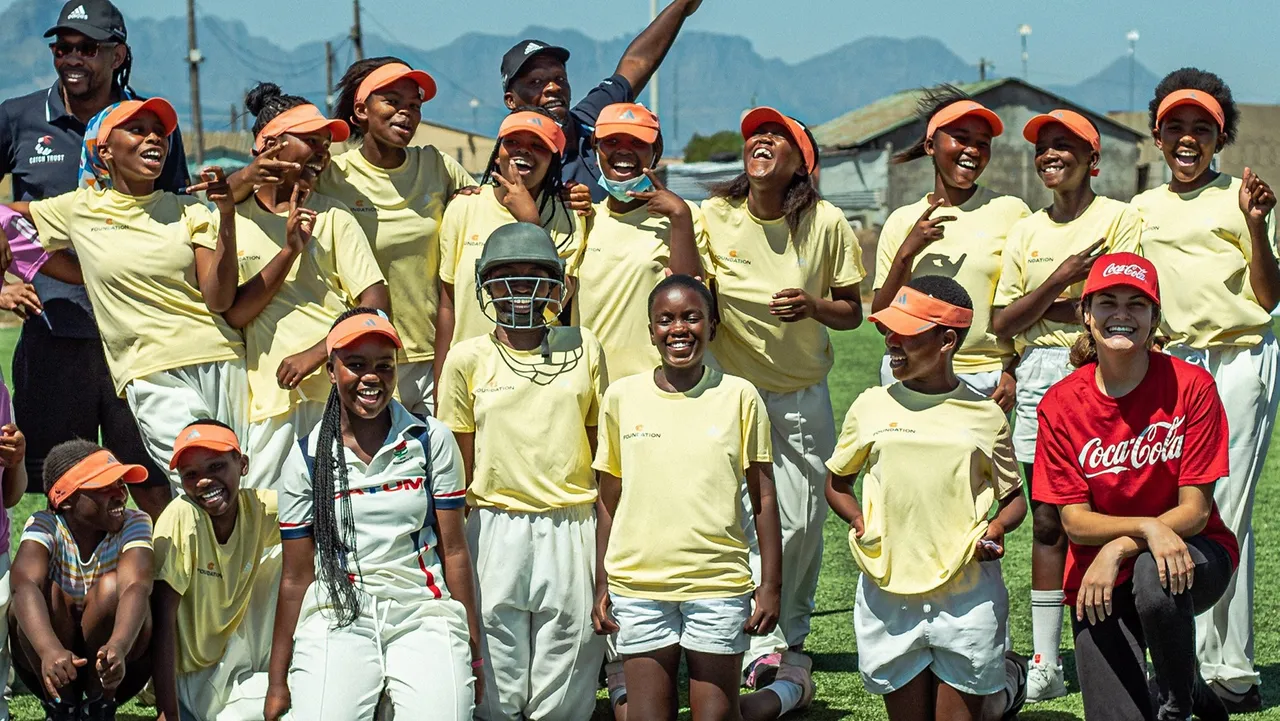 Undeprivileged children from Khayelitsha with other after a cricket training session, in Cape Town, South Africa