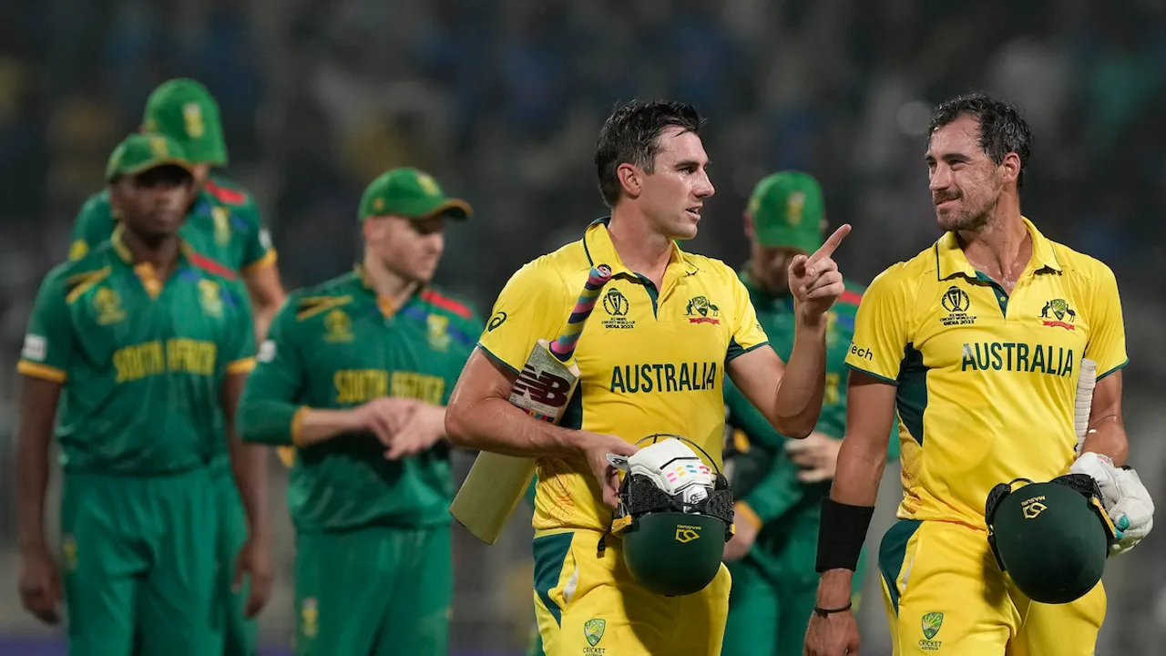 Australia's captain Pat Cummins and Mitchell Starc after winning the ICC Men's Cricket World Cup 2023 second semi-final match against South Africa, at the Eden Gardens Stadium, in Kolkata, Thursday, Nov. 16, 2023.