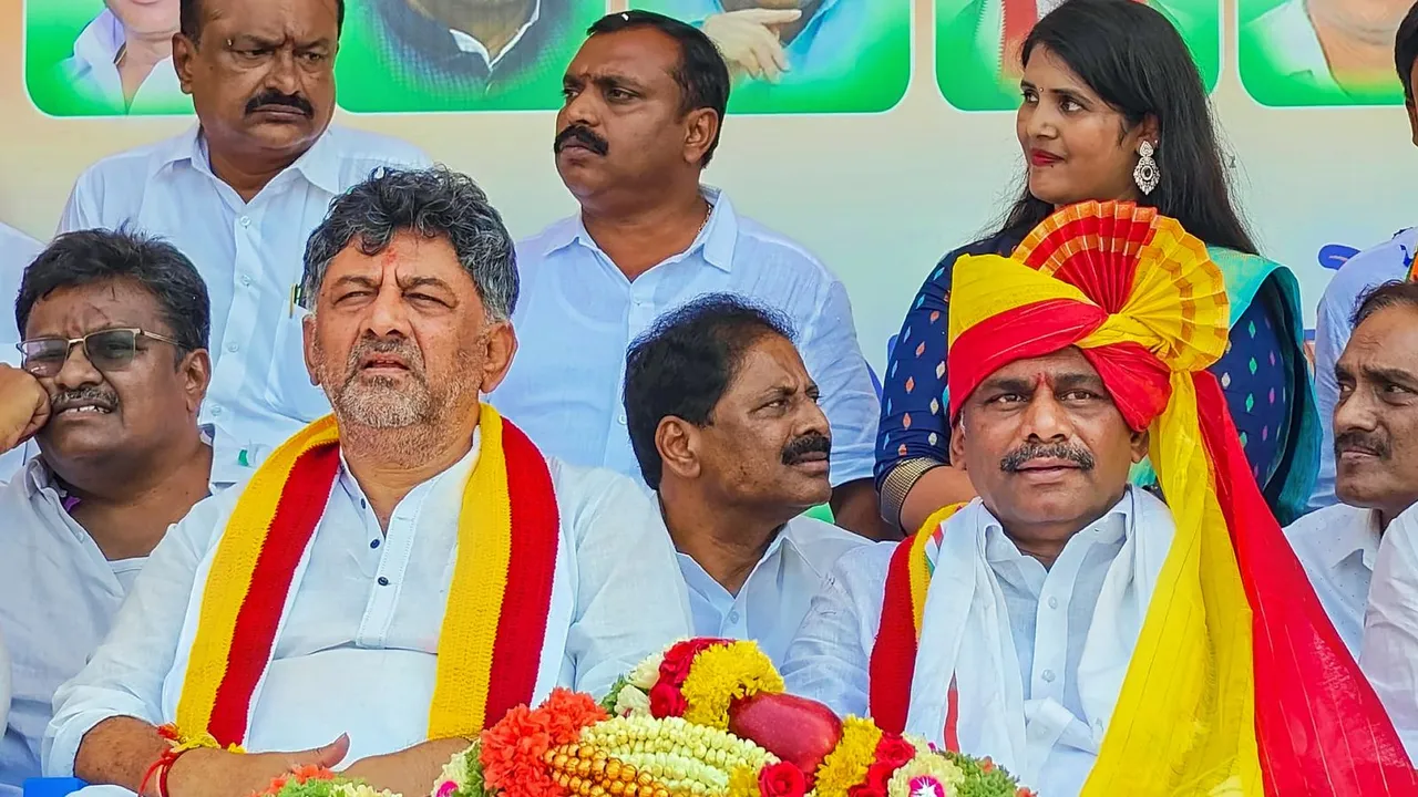 Karnataka Deputy Chief Minister DK Shivakumar with Congress candidate from Bengaluru Rural constituency DK Suresh during an election rally ahead of upcoming Lok Sabha elections