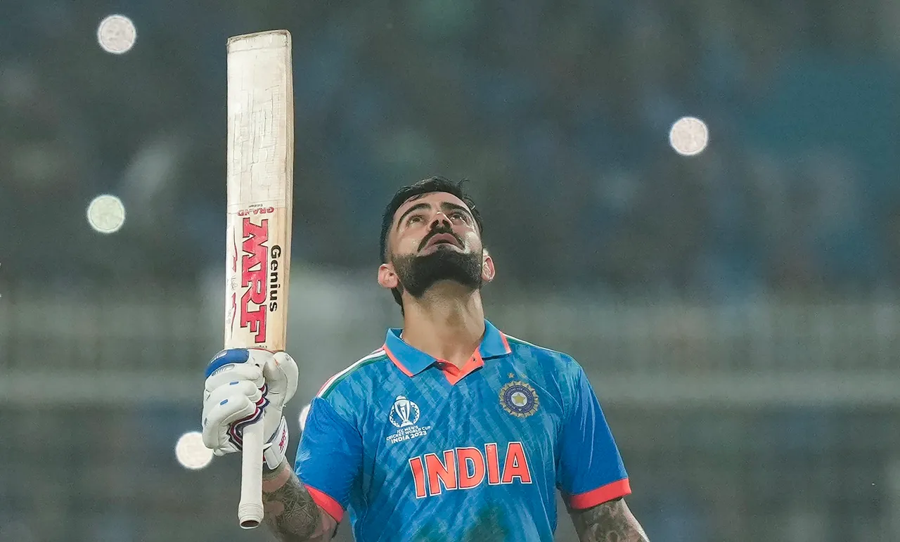 Indian batter Virat Kohli celebrates his century during the ICC Men's Cricket World Cup 2023 match between India and South Africa, at Eden Gardens, in Kolkata