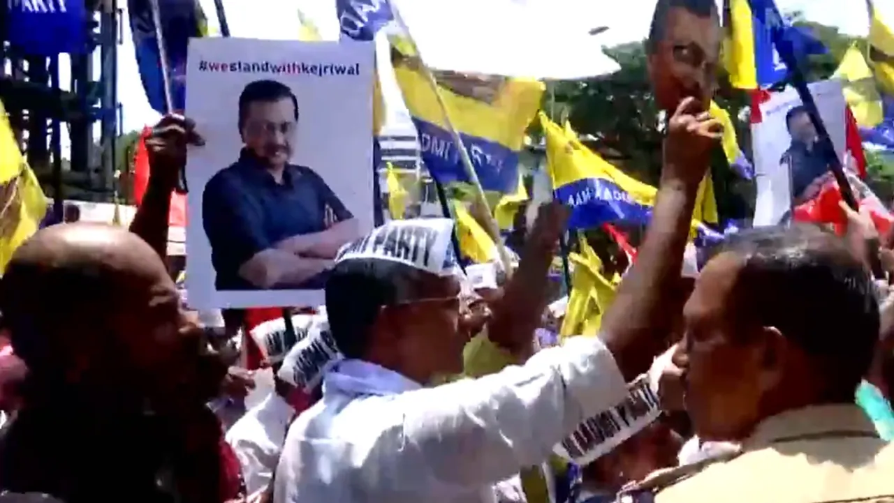 AAP Supporters protest against the arrest of Delhi CM Arvind Kejriwal in Kerala's Thiruvananthapuram.