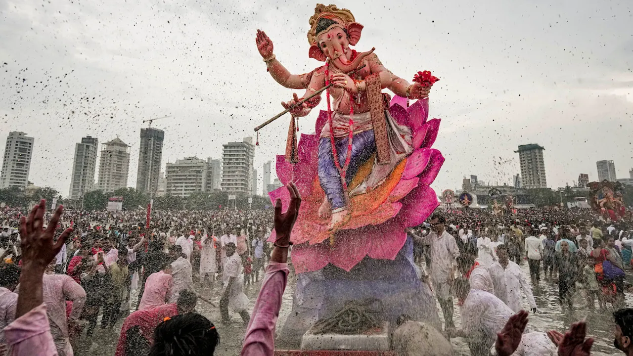 Devotees carry an idol of lord Ganesha for immersion in the Arabian Sea, marking the end of the 10-day long Ganesh Chaturthi festival, in Mumbai, Thursday, Sept. 28, 2023.