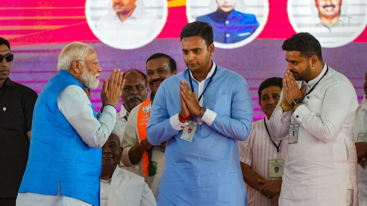 In a file image, Prime Minister Narendra Modi is seen sharing stage with Hassan MP Prajwal Revanna during election campaign