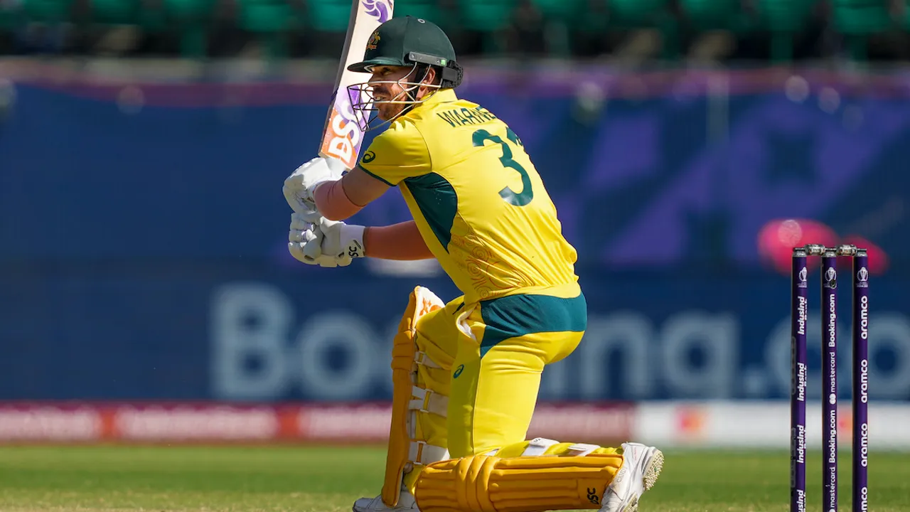 Australia's David Warner plays a shot during the ICC Men’s Cricket World Cup 2023 match between Australia and New Zealand, at HPCA Stadium, in Dharamshala, Saturday, Oct. 28, 2023.