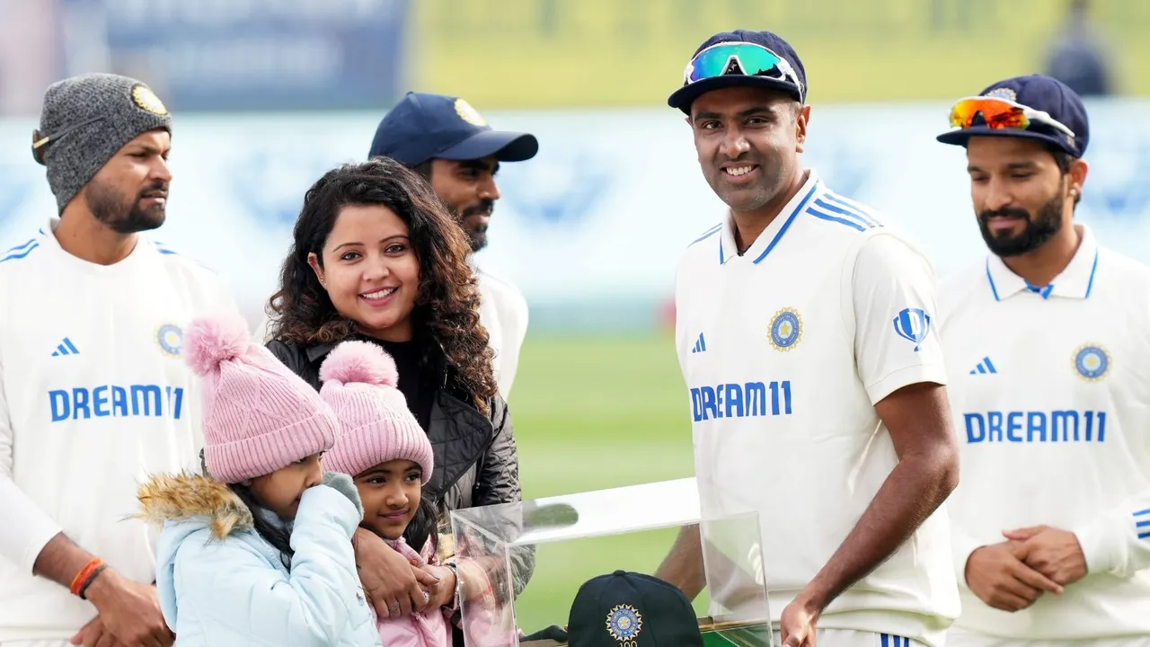 Ravichandran Ashwin with his family after receiving the 100th Test cap before the start of the fifth Test cricket match between India and England, in Dharamshala