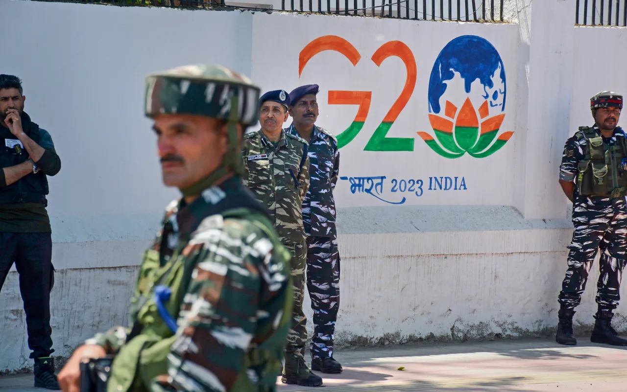 Security personnel stand guard during the high alert ahead of G20 tourism working group meeting, in Srinagar