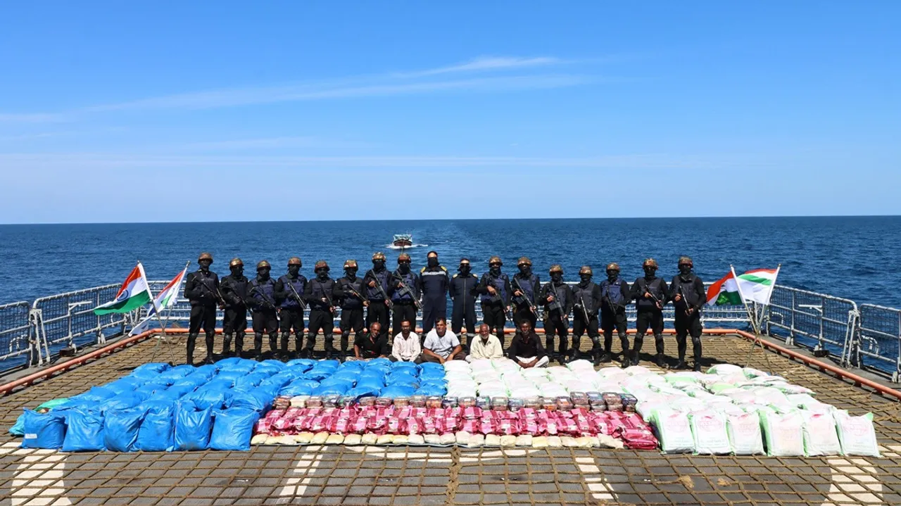 Indian Navy personnel show 3300Kgs contraband (3089kg Charas, 158kg Methamphetamine, 25kg Morphine) seized from a vessel in a joint operation with Narcotics Control Bureau (NCB).