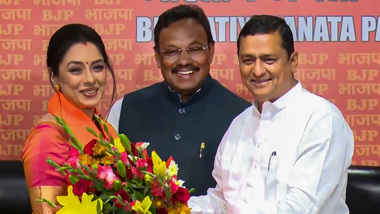 Actor Rupali Ganguly being felicitated by BJP leader Anil Baluni after joining the party amid Lok Sabha elections, in New Delhi, Wednesday, May 1, 2024