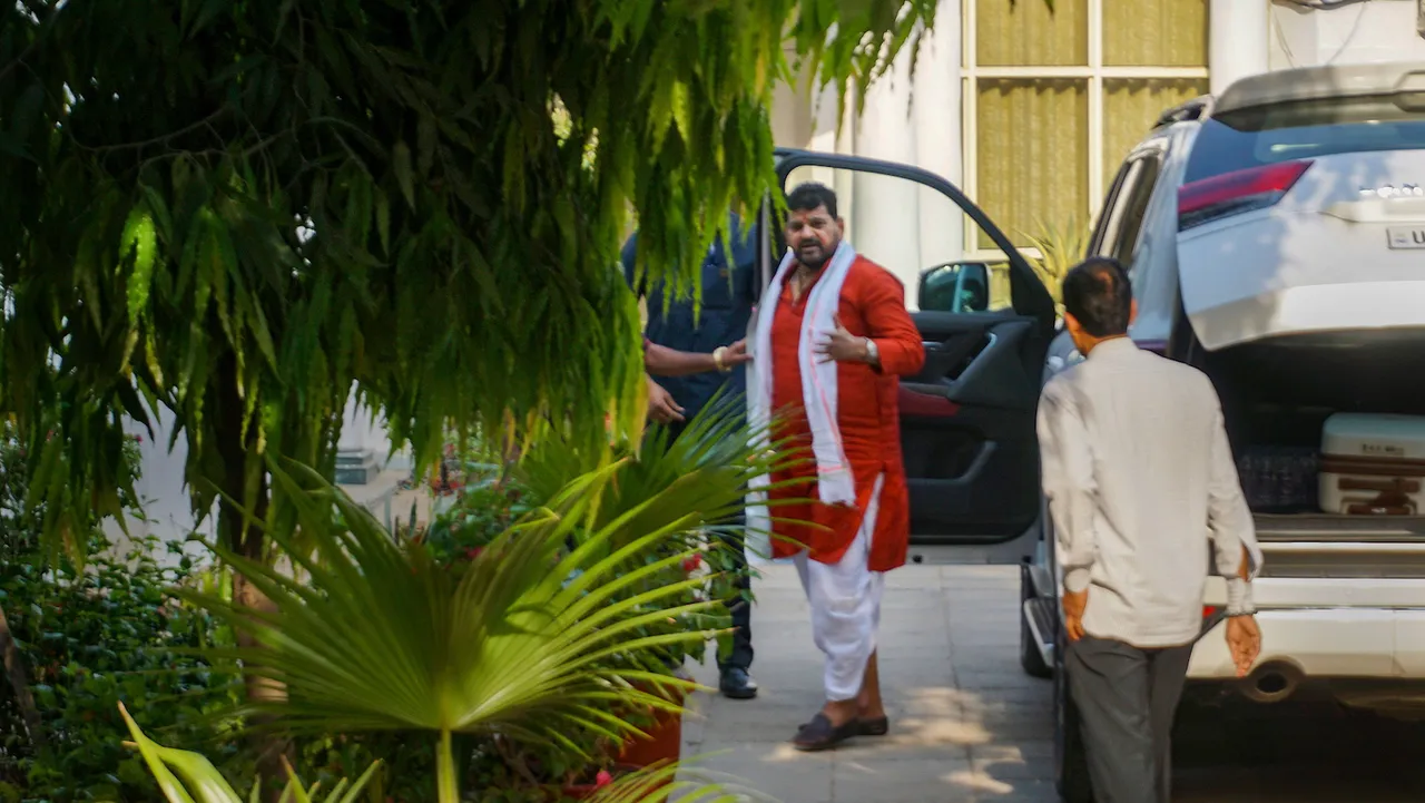 BJP MP and Wrestling Federation of India (WFI) chief Brij Bhushan Sharan Singh reaches his residence in New Delhi April 25