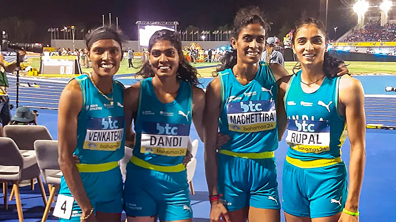 Indian women's 4x400m relay team members Rupal Chaudhary, M R Poovamma, Jyothika Sri Dandi and Subha Venkatesan pose for photos after qualifying for Paris Olympics, at the World Athletics Relays, in Nassau, Bahamas, Monday, May 6, 2024.