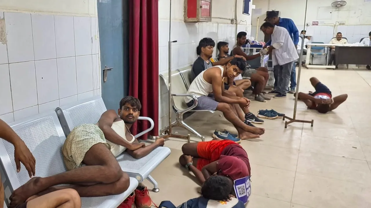 Youths, who came for a recruitment rally, lie on the ground of a hospital while receiving treatment, in Palamu, Monday, Sept. 2, 2024. At least 12 youths died during the recruitment rally of Product Constable across Jharkhand State.