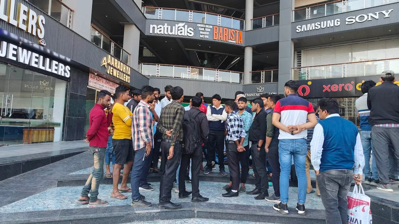 Visitors at the Galaxy Blue Sapphire Mall, where two men died on Sunday, March 3, 2024, allegedly after an iron grille fell on them from the fifth floor, in Noida Extension.