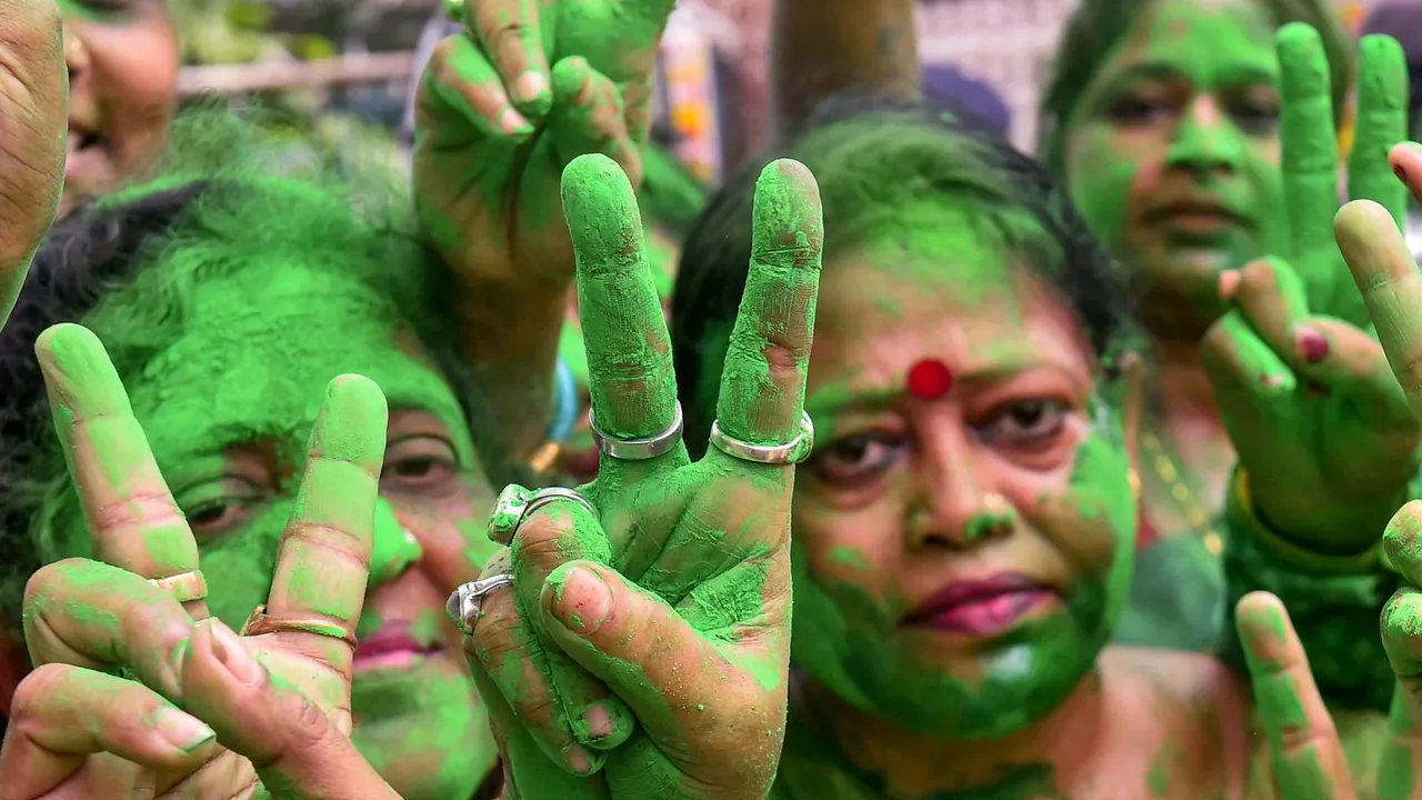 TMC supporters celebrate as party candidate Supti Pandey from Maniktala constituency leads during counting of votes for Assembly by-election, in Kolkata, Saturday, July 13, 2024.