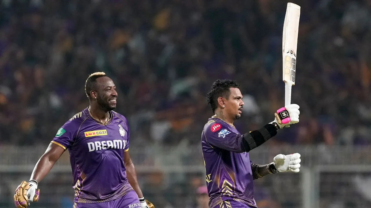 Kolkata Knight Riders batter Sunil Narine celebrates his century with teammate Andre Russell during the Indian Premier League (IPL) 2024 cricket match