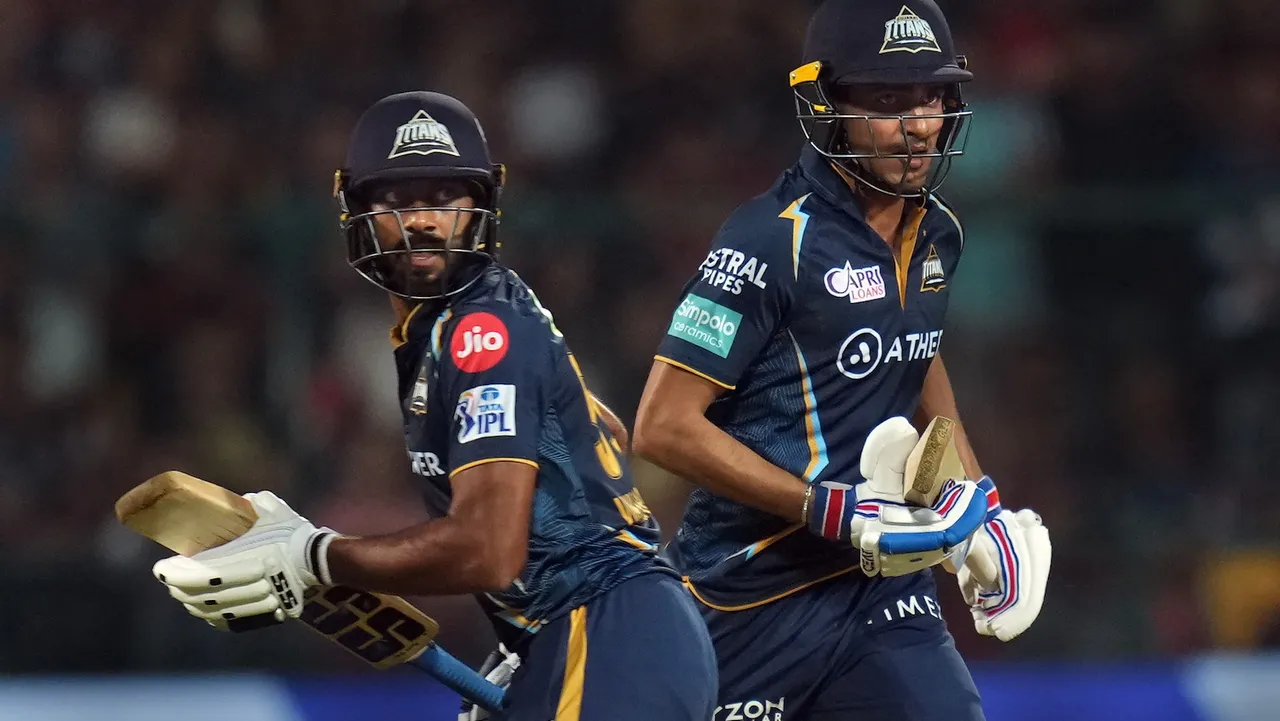 Gujarat Titans batters Shubman Gill and Vijay Shankar run between the wickets during the IPL 2023 cricket match between Royal Challengers Bangalore and Gujarat Titans, at M Chinnaswamy Stadium in Bengaluru on May 21