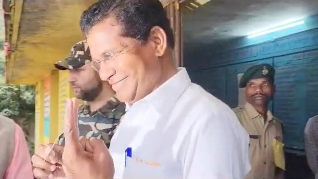 Mohan Markam poses for photo after casting his vote in Kondagaon, Chhattisgarh