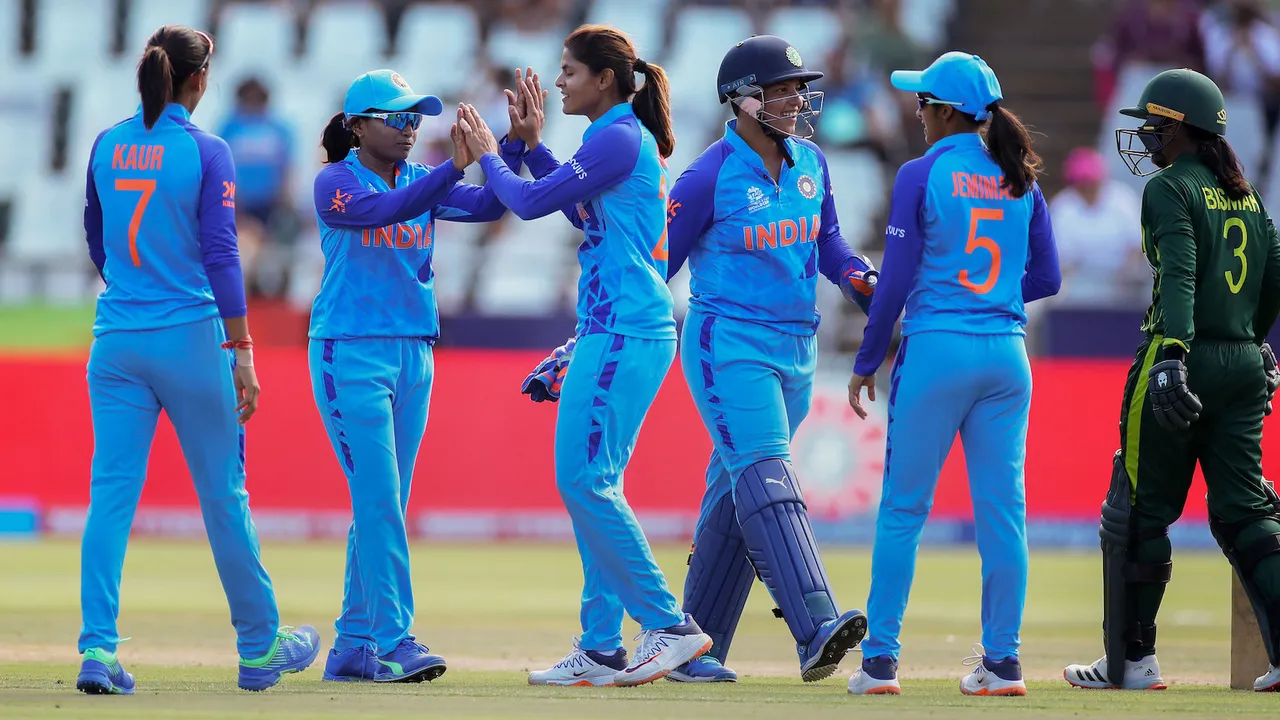 Indian woman player Radha Yadav with Richa Ghosh and teammates celebrates the wicket of Pakistan's Sidra Ameen during the ICC Women's T20 World Cup 2023 match between India women and Pakistan women in Newlands, Cape Town on Sunday