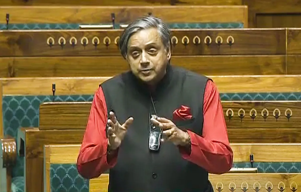 Congress MP Shashi Tharoor speaks in the Lok Sabha during the Budget session of Parliament, in New Delhi