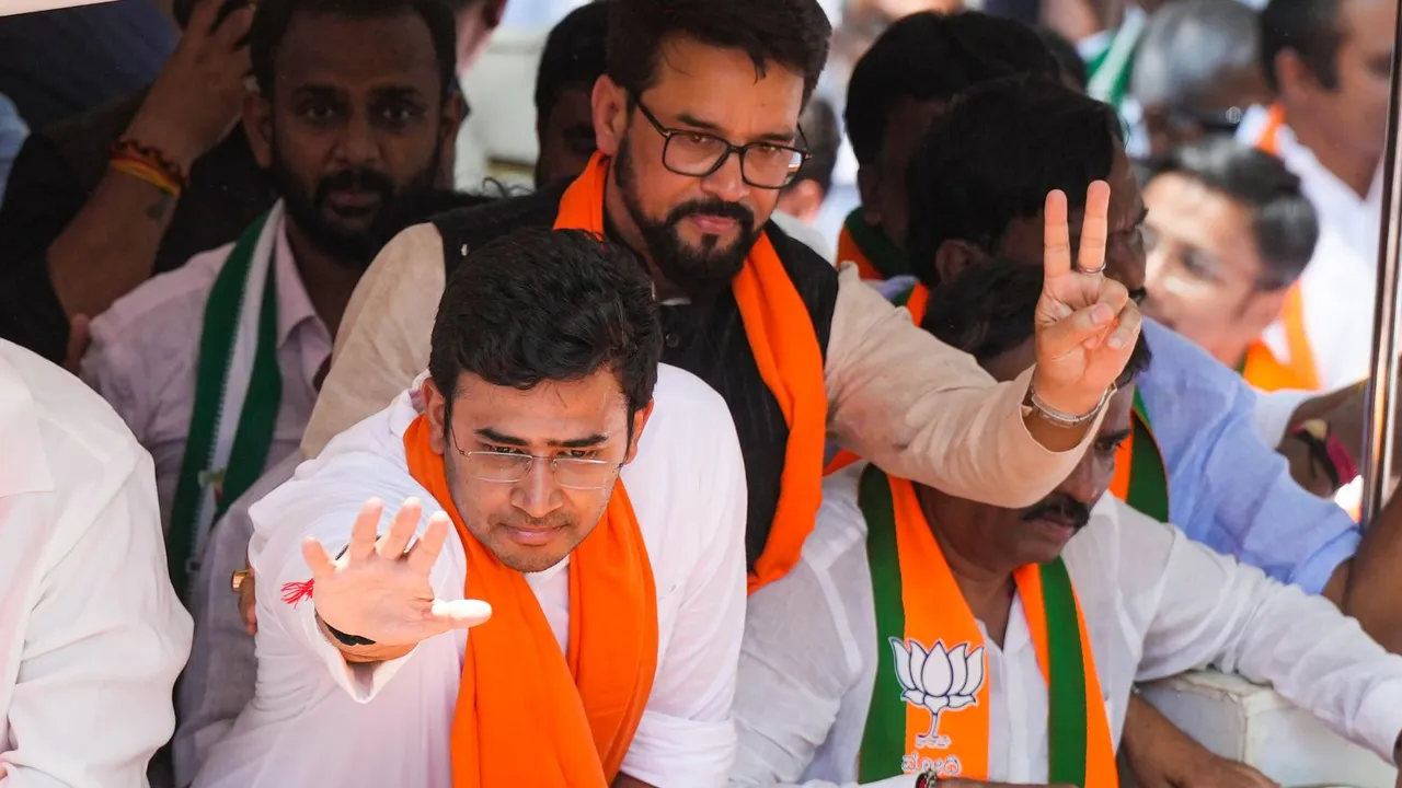 Bengaluru South BJP candidate Tejasvi Surya with Union Minister Anurag Thakur and others during a rally before filing his nomination papers for Lok Sabha elections