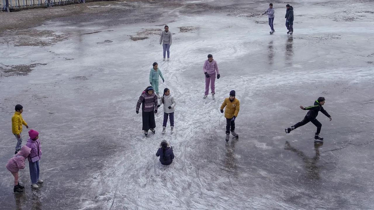 Tourists at an ice-skating rink at Lakkar Bazar, in Shimla