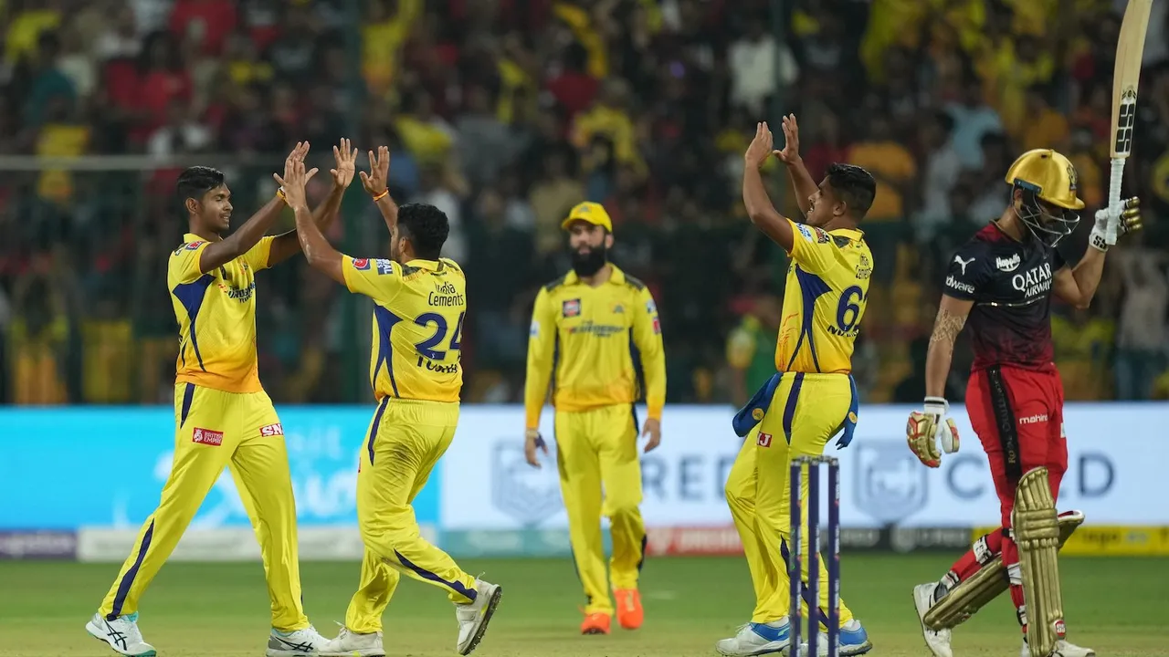 Chennai Super Kings players celebrate after winning their IPL 2023 cricket match against Royal Challengers Bangalore on April 17