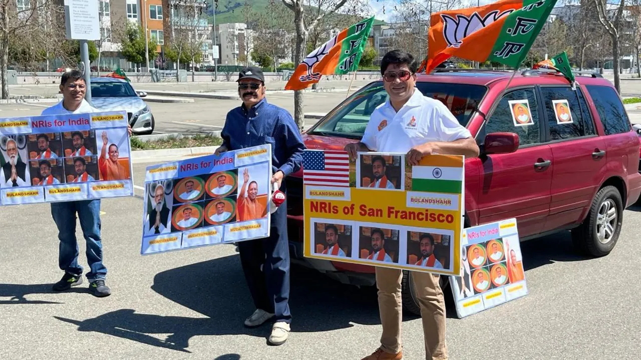 Members and supporters of the Overseas Friends of BJP take part in a rally in support of Prime Minister Narendra Modi ahead of upcoming Lok Sabha elections in India, in USA, Sunday, March 31, 2024.