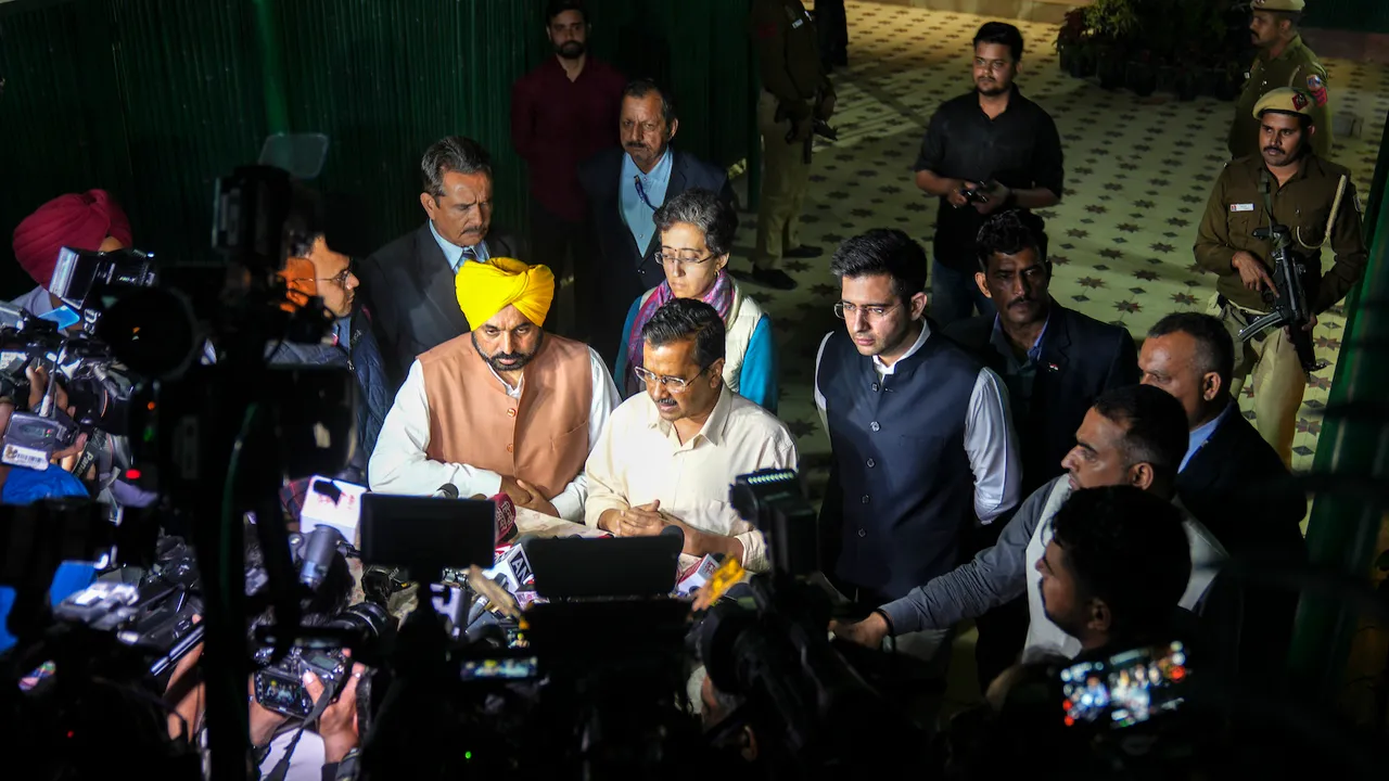 Arvind Kejriwal with Bhagwant Mann and AAP leaders Atishi Marlena and Raghav Chadha speaks with the media outside the residence of Manish Sisodia