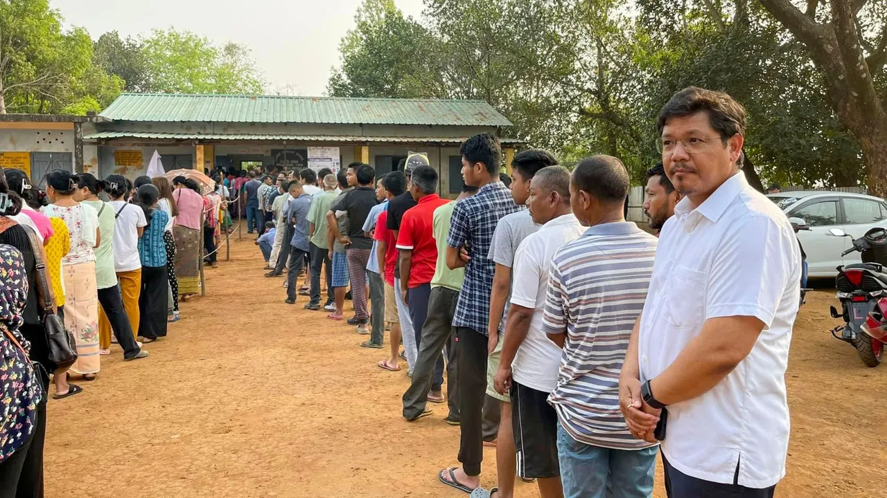 Meghalaya Chief Minister Conrad Sangma waits in a queue to cast his vote for the first phase of Lok Sabha elections, in West Garo Hills district, Friday, April 19, 2024